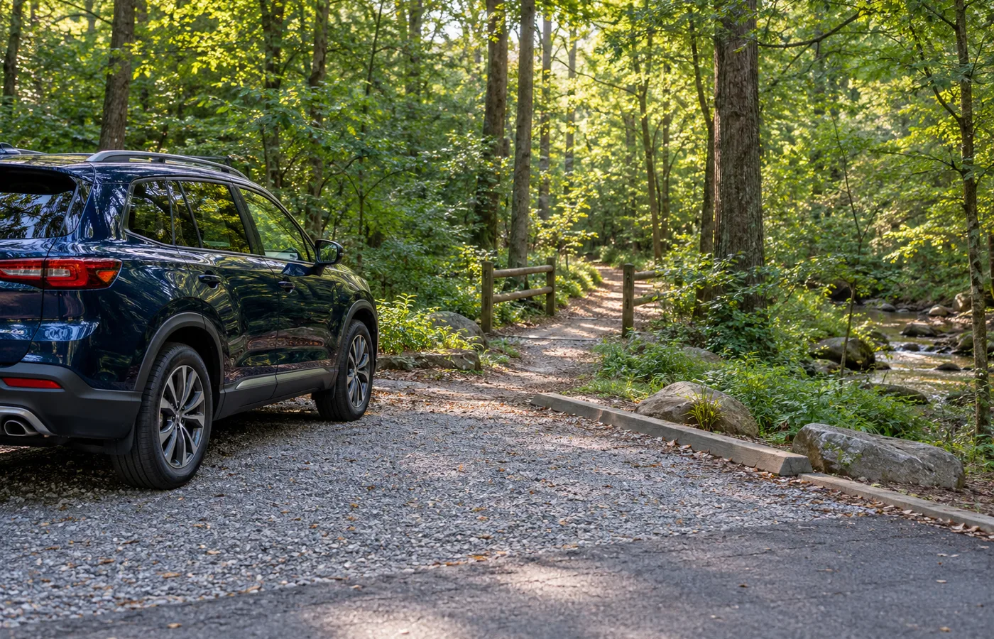 Representative Roswell Georgia woodland parking area with a blue SUV beside a pedestrian trail.
